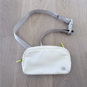 lululemon athletica Cream Crossbody Belt Bag with Gray Strap and Lime Accents